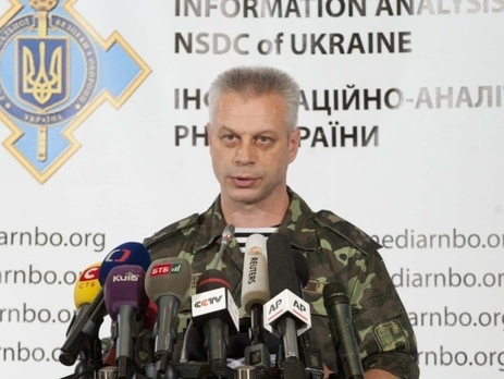 Спикер АП Лысенко: В Докучаевске на блокпосту боевик выстрелил в голову местному жителю