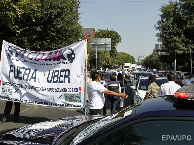 После массовых протестов таксистов во Франции арестовали двух топ-менеджеров компании Uber