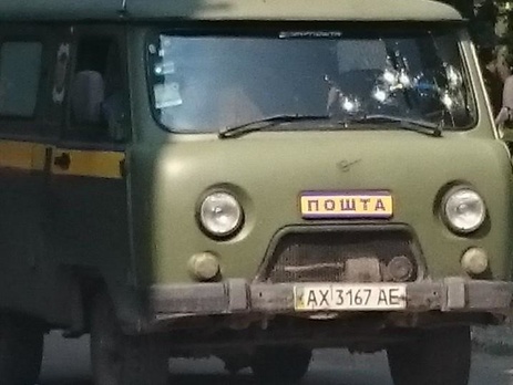 Очевидцы: Убийца работников почты в Харькове ждал машину, сидя в маске и с автоматом