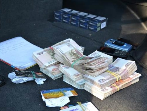СБУ заблокировала схему незаконного обмена гривен, похищенных в луганских банках
