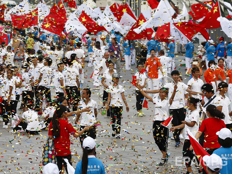 Китай празднует победу в борьбе за право принимать зимнюю Олимпиаду-2022. Фоторепортаж