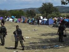 Новости недели в фотографиях: Протесты в Бразилии, наплыв мигрантов в ЕС, падение нефти ниже $46 за баррель