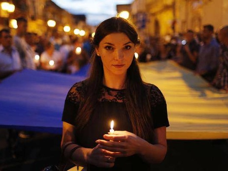 В Неаполе прошло шествие памяти погибшего при попытке задержать грабителей украинца Анатолия Короля. Фоторепортаж